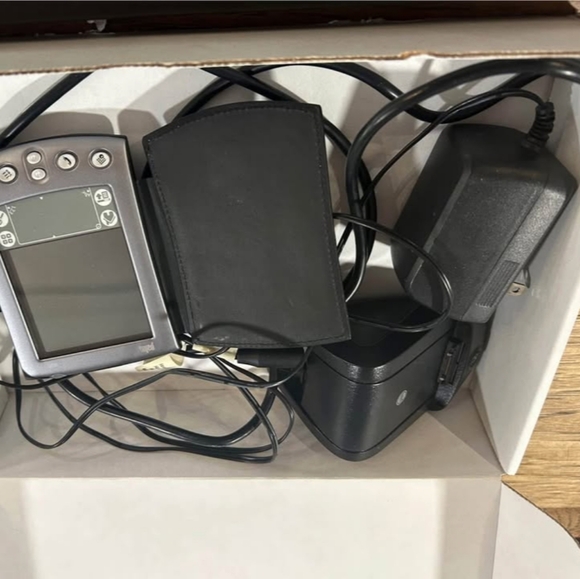 Black and Silver Electronic Device with Accessories
